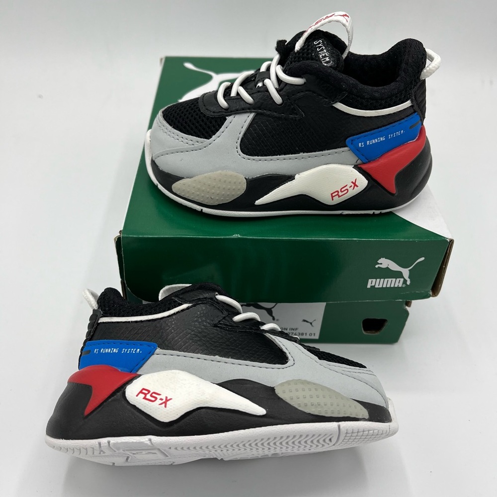 Puma RS-X
Size 4c Toddler 
Brand New/ never worn 
Black/multicolor 
Original Box - Picture 2 of 9